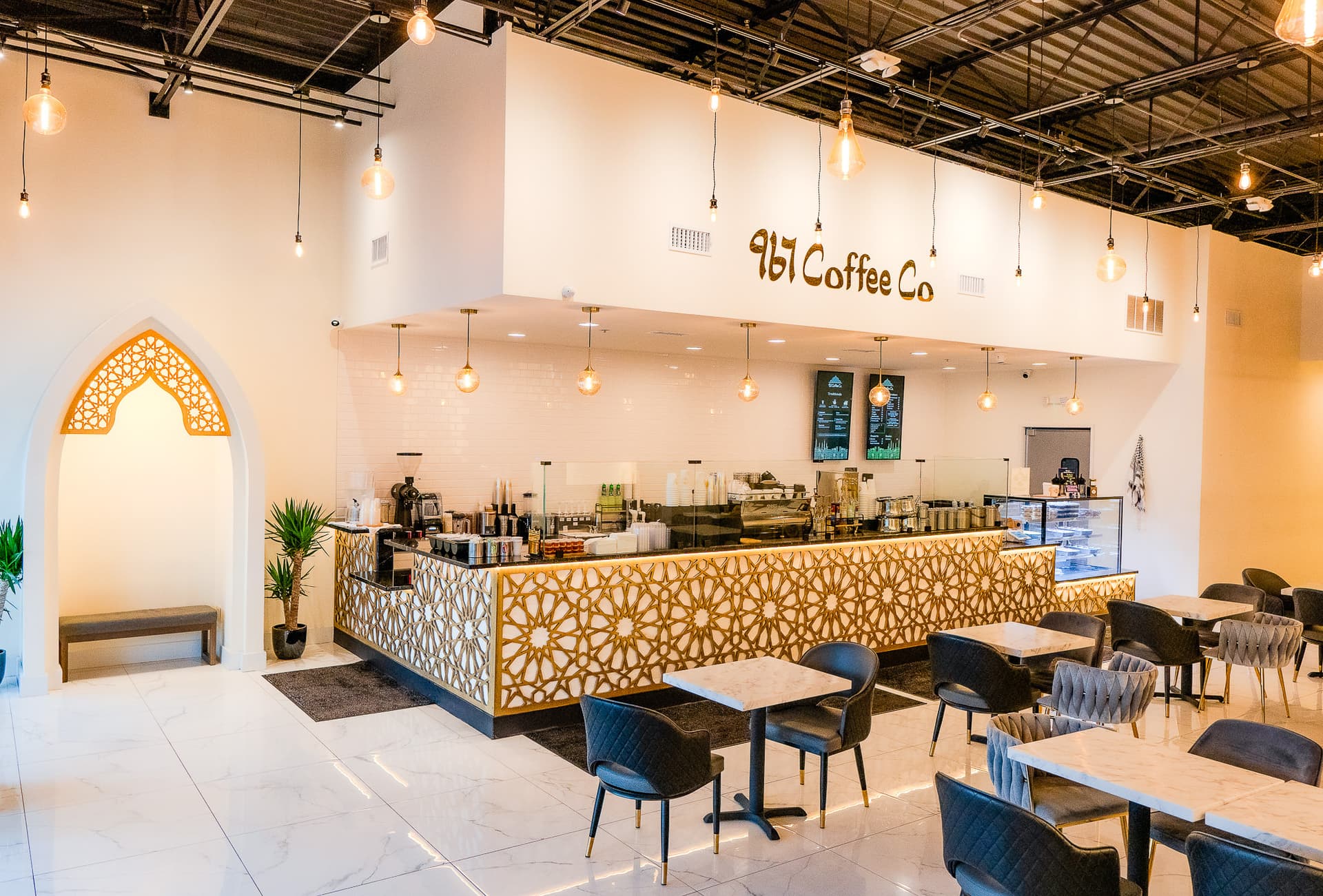 967 Coffee Co. interior — warm Yemeni coffee shop in Roswell, GA